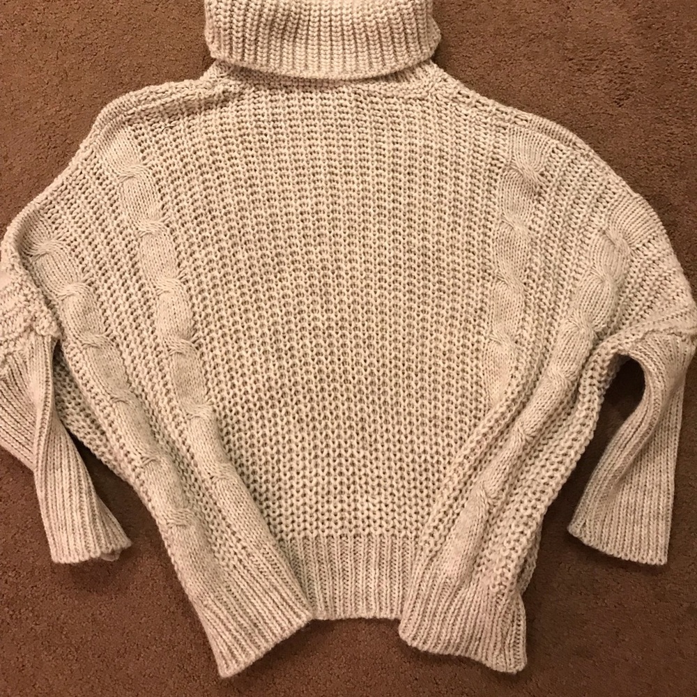 Never worn tan turtleneck sweater
